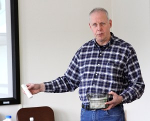 Bob Gorman of the Sitka office of the University of Alaska Fairbanks Cooperative Extension Service shows some germinating seed starts during a free garden workshop on March 11, 2009. 