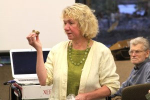 Elizabeth Kunibe shows off a Tlingít potato (also known as "Maria's potato")