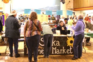 Doug Osborne answers questions at the Sitka Farmers Market table during the 2009 Let's Grow Sitka garden show
