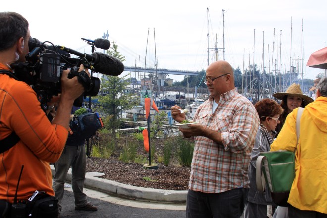 TV personality Andrew Zimmern is filmed as he samples some blackcod tips during the Aug. 18, 2012, Sitka Farmers Market.