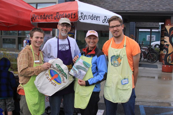 PHOTO COURTESY OF SITKA LOCAL FOODS NETWORK Sitka Farmers Market Interim Manager Garrett Bauer, left, and Co-Manager Francis Wegman-Lawless, right, present the Table Of The Day Award to Peter Apathy and Carole Knuth of Reindeer Redhots at the fourth market of the season on Saturday, Aug. 17, at the Alaska Native Brotherhood Founders Hall in Sitka. Peter and Carole sell Alaska-made reindeer and all-beef hot dogs and Polish sausage, with sauerkraut and chili sides from their cart, which is open at the corner of Lincoln and Lake streets on most big cruise ship days (http://reindeerredhots.com/). They received a gift bag with fresh produce, fresh rhubarb jam and a copy of the Alaska Farmers Market Cookbook. This is the sixth year of Sitka Farmers Markets, hosted by the Sitka Local Foods Network. The next market is from 10 a.m. to 1 p.m. on Saturday, Aug. 31, at the Alaska Native Brotherhood Founders Hall, 235 Katlian St. For more information about the Sitka Farmers Markets and Sitka Local Foods Network, go to http://www.sitkalocalfoodsnetwork.org/.