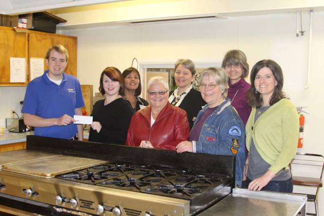 The Sitka Health Summit congratulates the folks at Sitka Kitch and First Presbyterian Church on their $13,000 grant. The funds will go a long way towards renovation of their community kitchen. "Sitka Kitch is a community collaboration to augment and strengthen Sitka's workforce through the development of food-based curriculum and training." It is an initiative of the Sitka Health Summit. From left are Patrick Williams, Marjorie Hennessy, Clara Gray, Cheri Hample, Martina Kurzer, Suzan Brawnlyn, Cyndy Gibson, and Betsy Decker. (Photo Courtesy of the Sitka Health Summit)