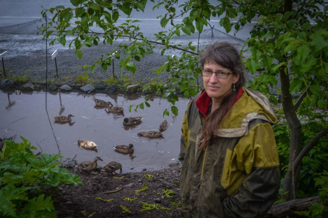 Lori Adams poses with some of the ducks she keeps to help keep slugs at bay at her Down-To-Earth U-Pick Garden. (Photo Courtesy of Sitka Conservation Society)