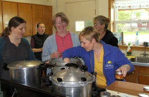 SarahLewisLoadsJarsIntoPerryAndMichellesCanner