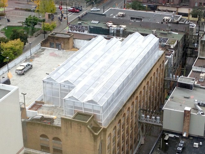 Rooftop greenhouses, such as this one on top of a parking garage in Vancouver, British Columbia, are becoming more popular around the world. The rooftop greenhouse project from the 2015 Sitka Health Summit is hoping this might be an option for Sitka, where land is at a premium. (Photo from http://www.cityfarmer.info/)